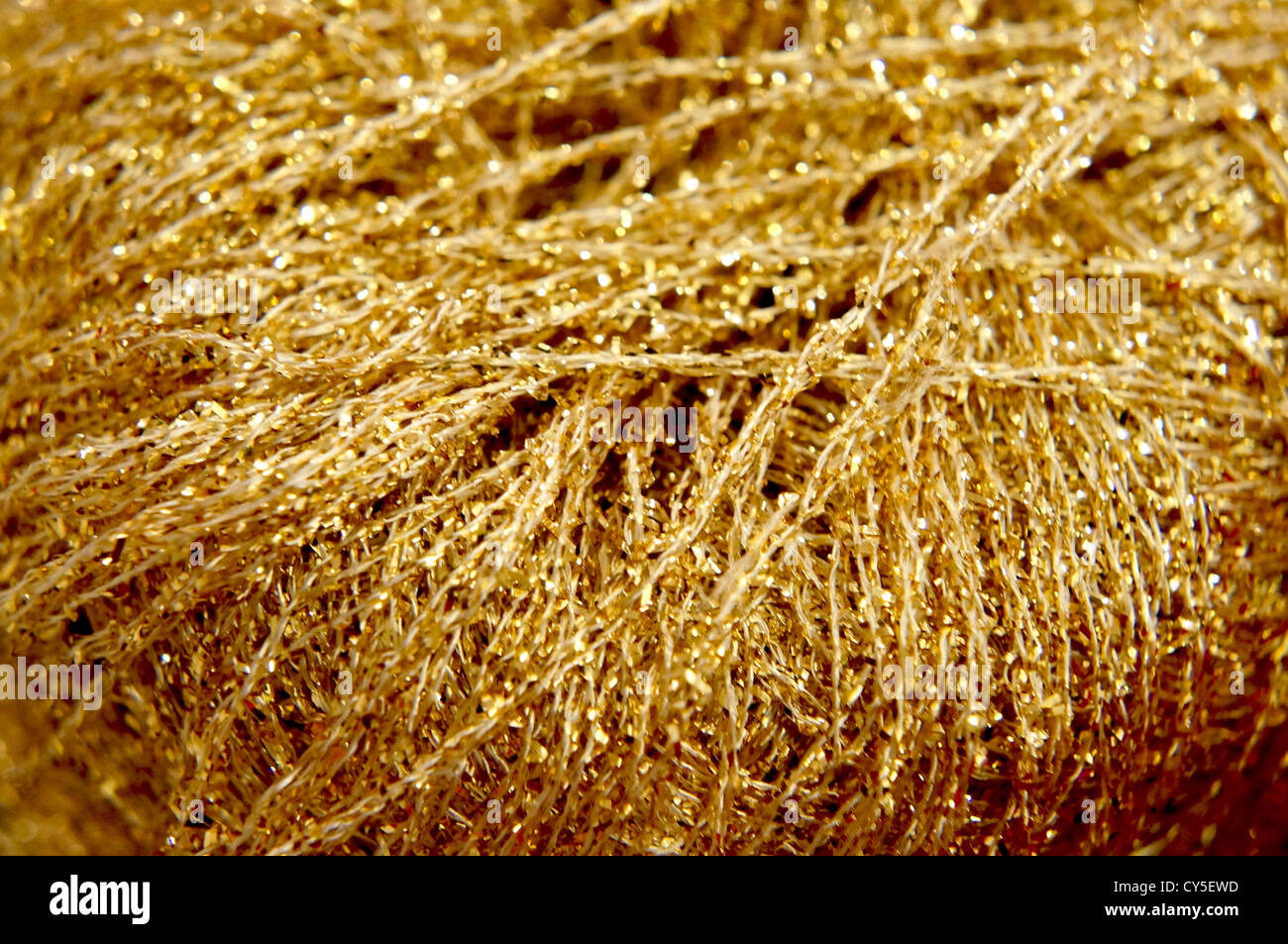 Golden yarn hi-res stock photography and images - Alamy