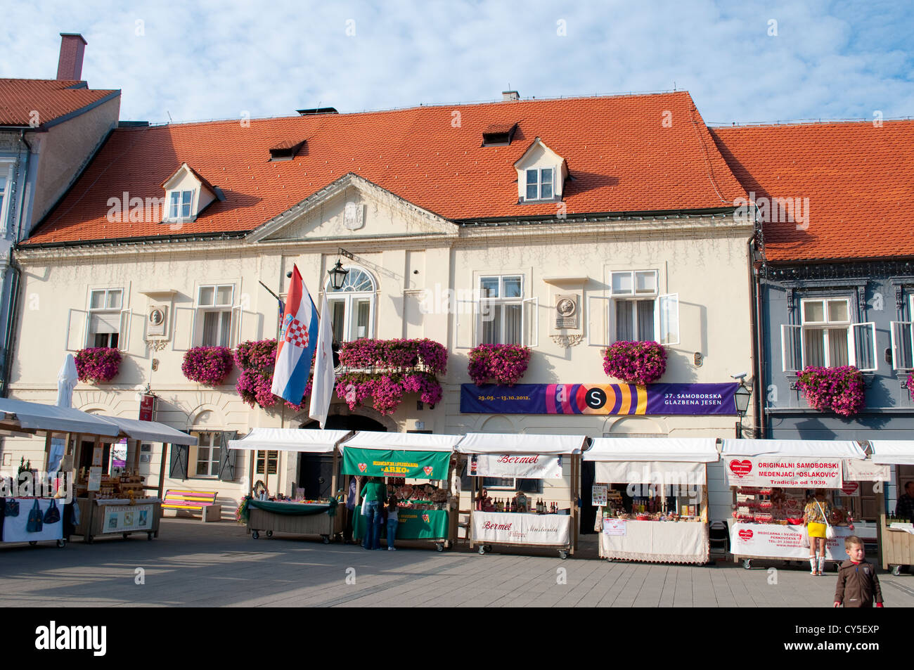 Town Hall and stalls selling local produce on the main square in the town of Samobor, Croatia Stock Photo