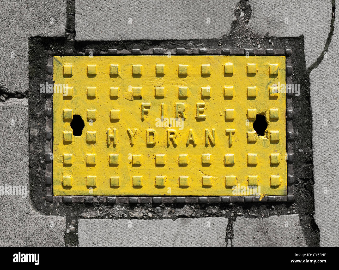 yellow fire hydrant cover Stock Photo Alamy