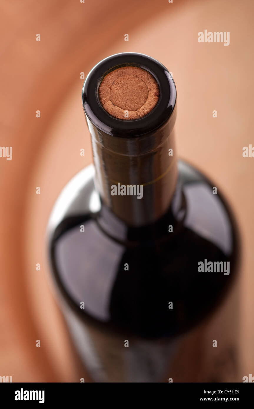 Bottle of Red Wine On A Barrel with shallow depth of field Stock Photo