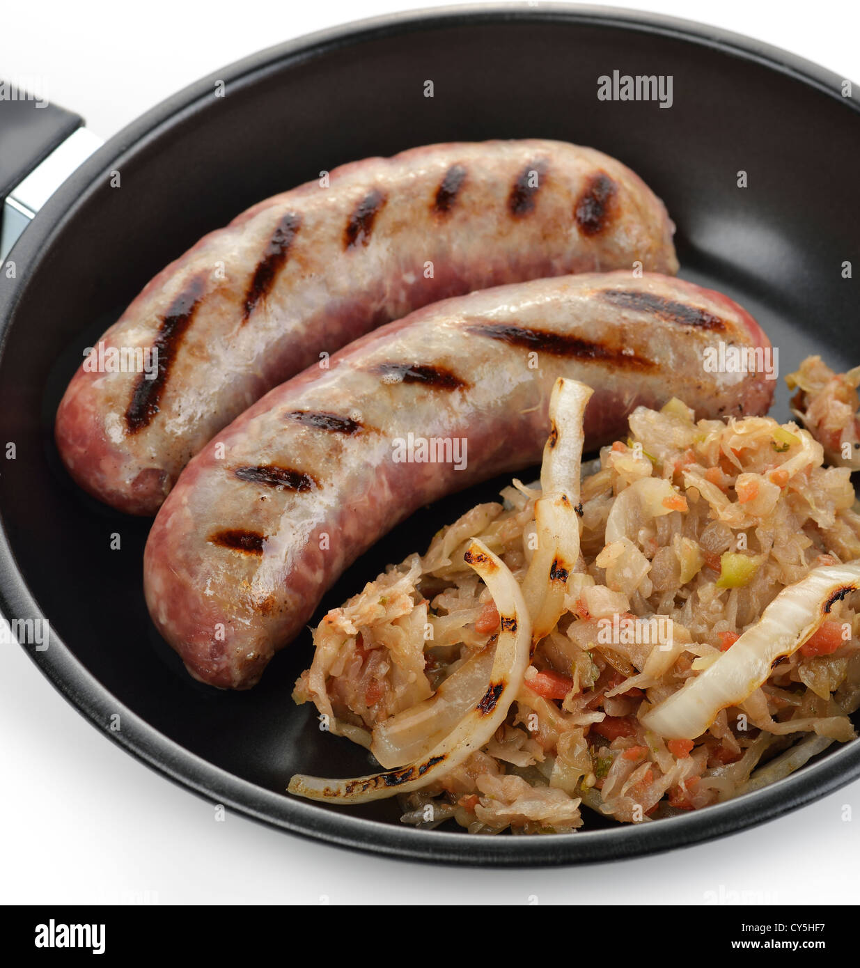 Sausages With Sauerkraut In A Frying Pan Stock Photo Alamy