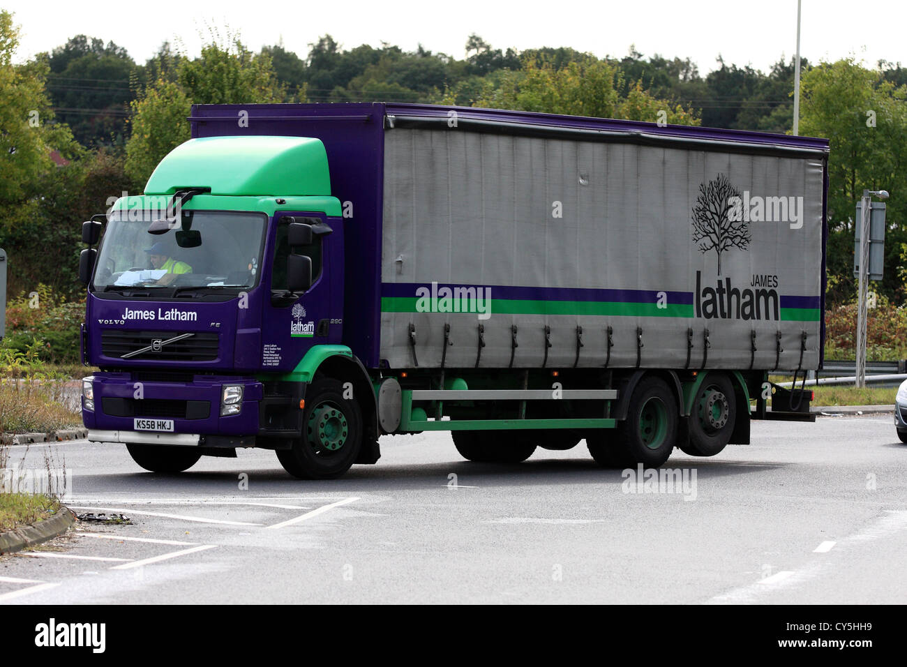 An ' truck traveling along a road in London, England Stock Photo