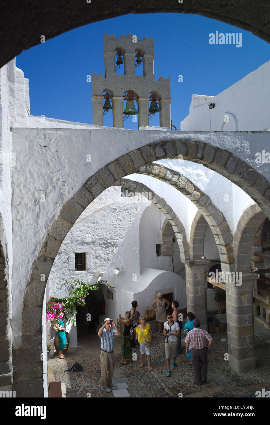 central area with tourist visitors and with 5 bells above Stock Photo