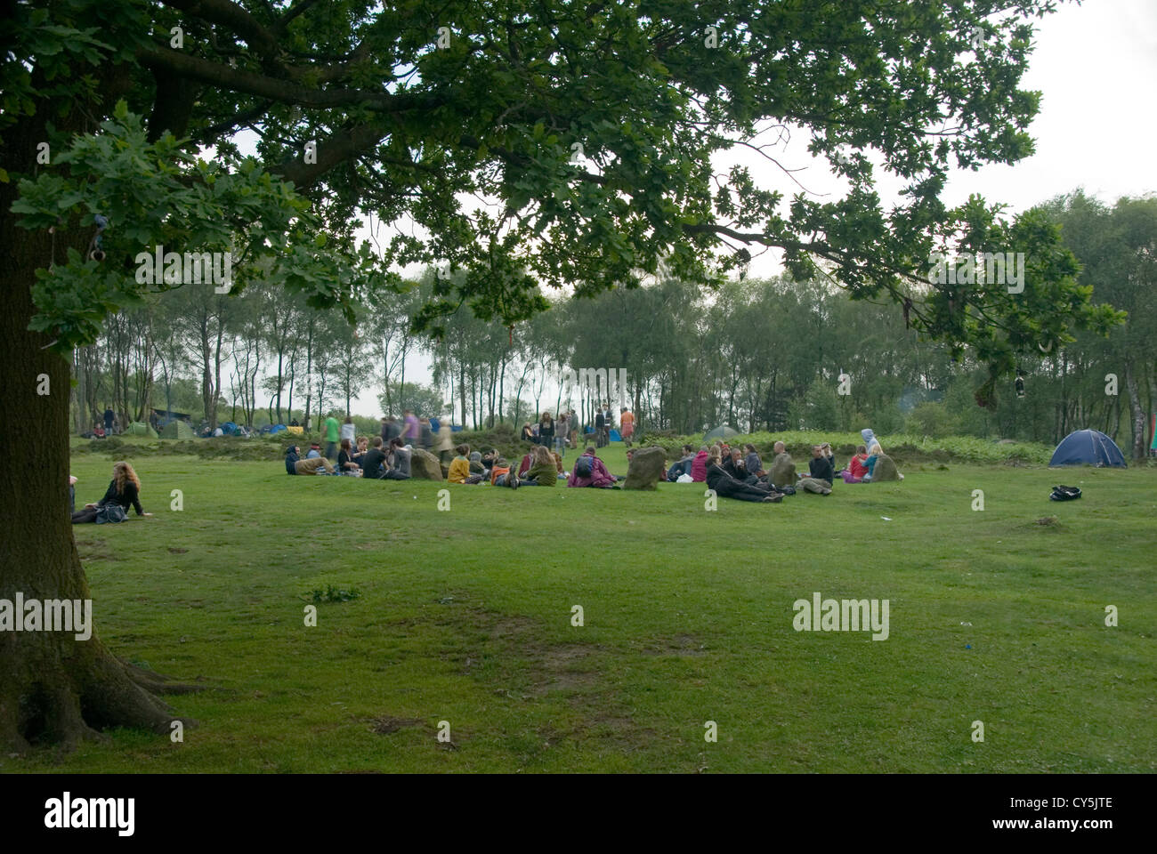Crowds Begin to Gather to Celebrate the Summer Solstice at Nine Ladies Stone Circle, Pagan Gathering, Stock Photo
