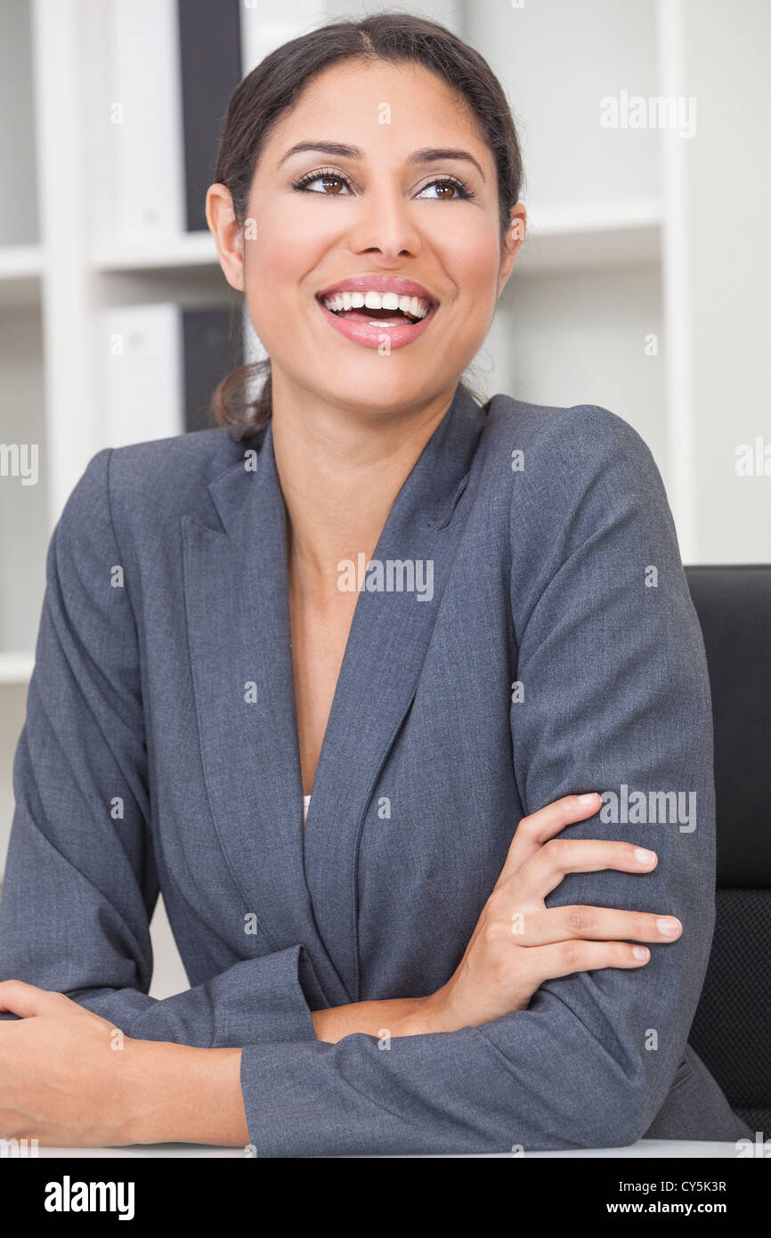 Beautiful happy young Latina Hispanic woman or businesswoman in smart ...