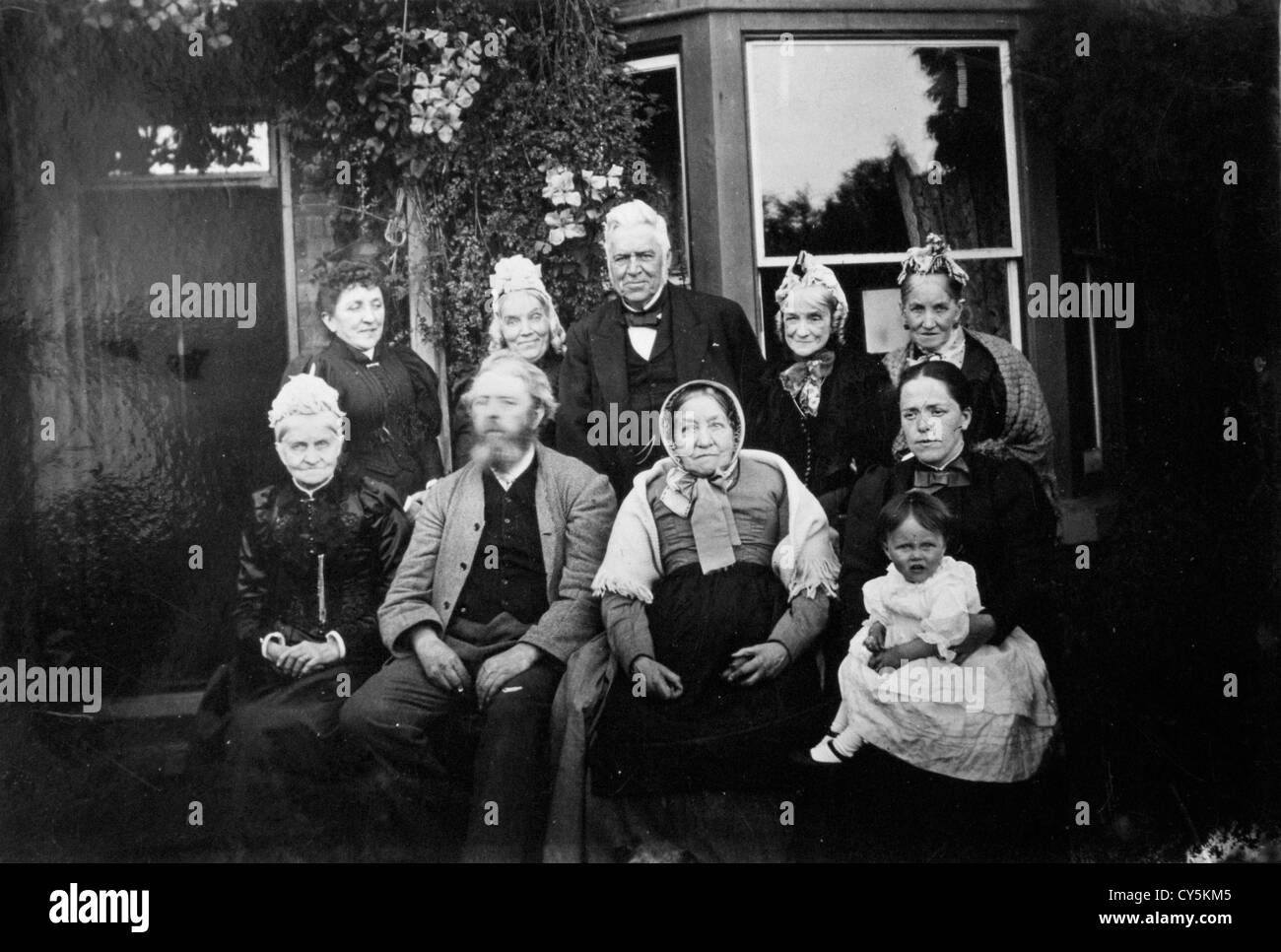 Victorian family group photographs Birmingham UK 1890s. Nine members of the same family and their family staff retainer.  They were timber merchants in Birmingham having moved from Huddersfield Yorkshire during the industrial revolution, where they had a school and were cloth merchants. Relatives of this content supplier. HOMER SYKES Stock Photo