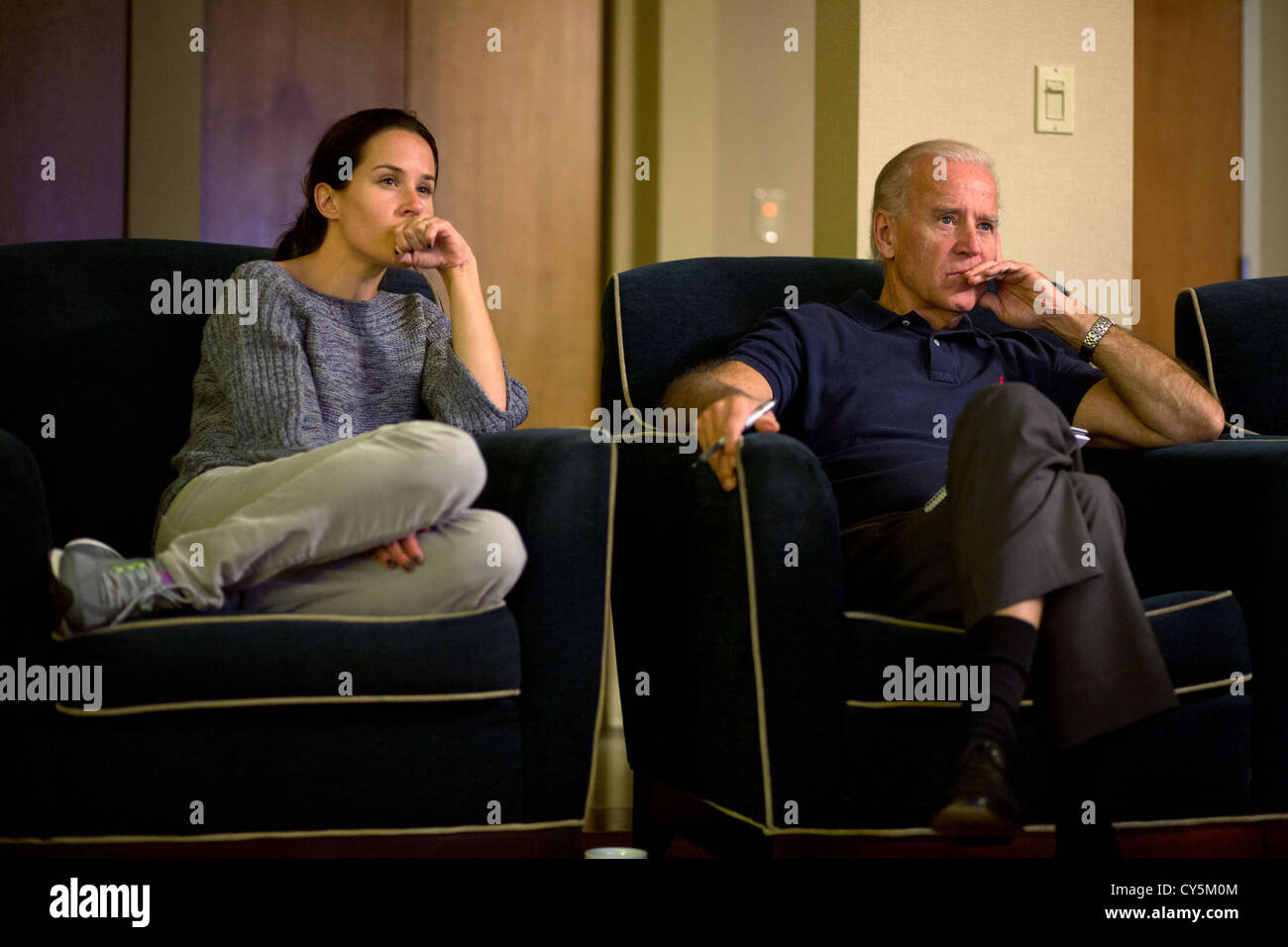 Vice President Joe Biden and his daughter Ashley Biden watch the third presidential debate from a hotel room October 22, 2012 in Toledo, Ohio. Stock Photo