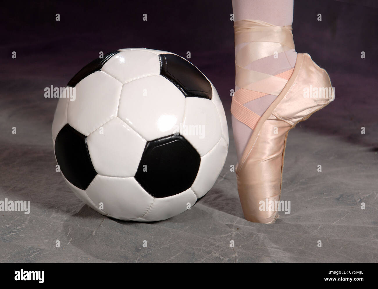 Soccer - Football and Ballet Pointe Shoe Stock Photo