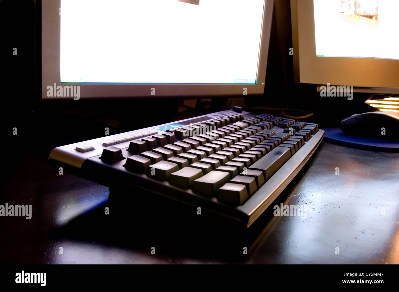 Two monitor computer workstation with wireless keyboard and mouse Stock ...