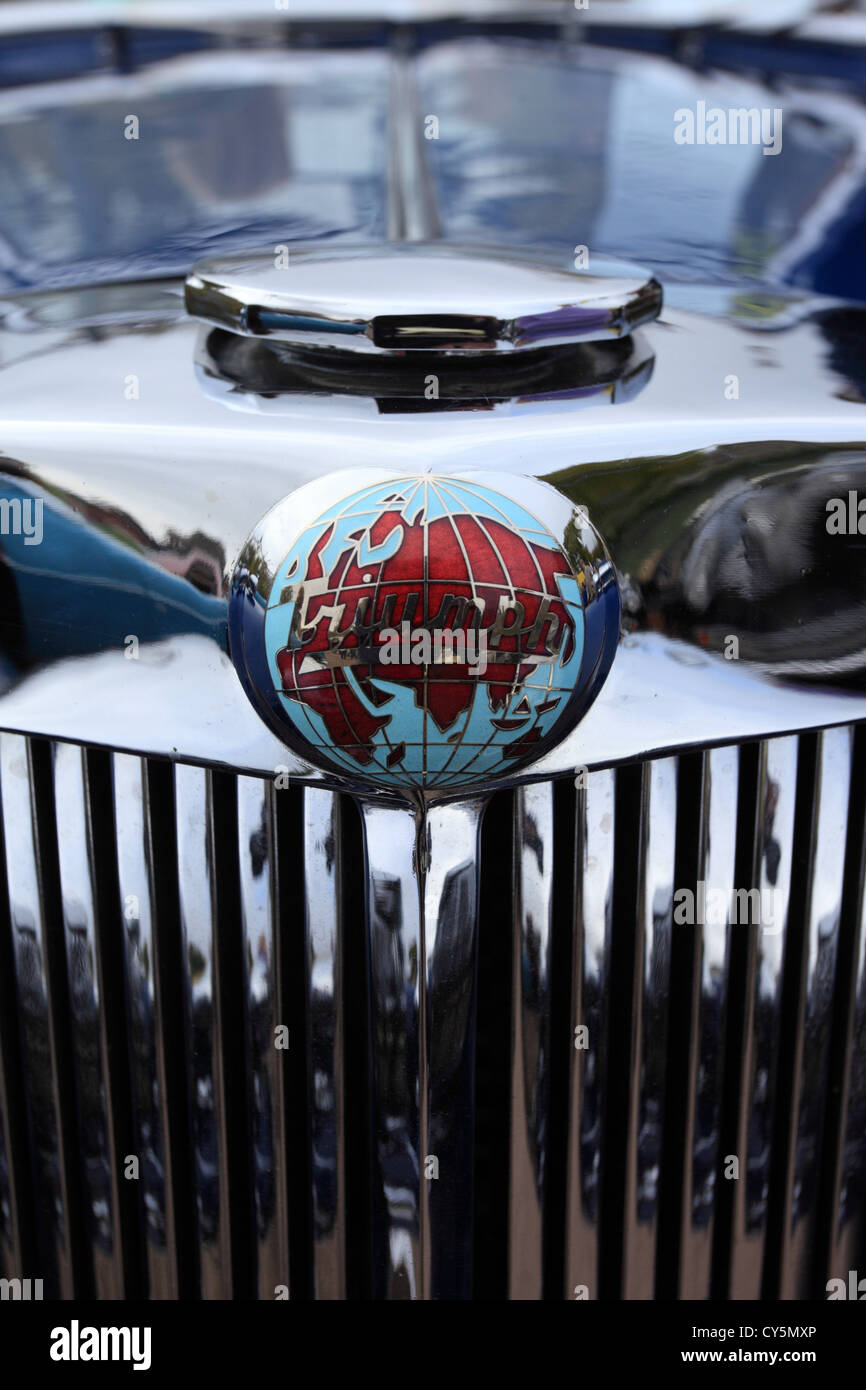 Vintage triumph car badge showing the globe on a mid twentieth