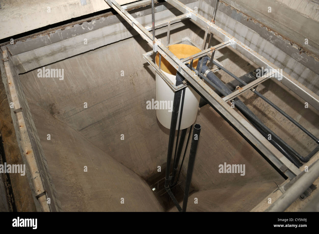 Empty water treatment facility sewage settlement tank in a large resort hotel Stock Photo
