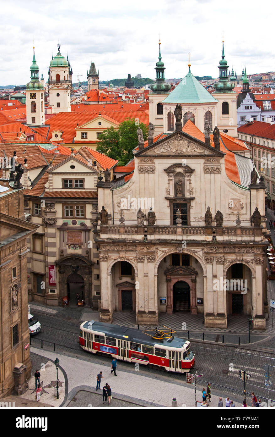Tram 17 in Krizovnicke (Knights of the Cross) Square with St. Salvator Church in Prague Stock Photo