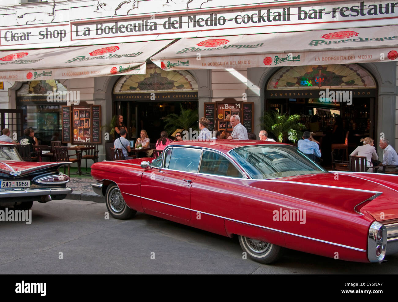 Classic 60s cars at Prague's La Bodeguita del Medio named after the Havana restaurant popular with Ernest Hemingway Stock Photo
