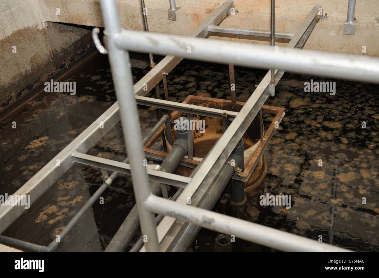 Sewage settlement tank, part of water treatment facility in a large resort hotel Stock Photo