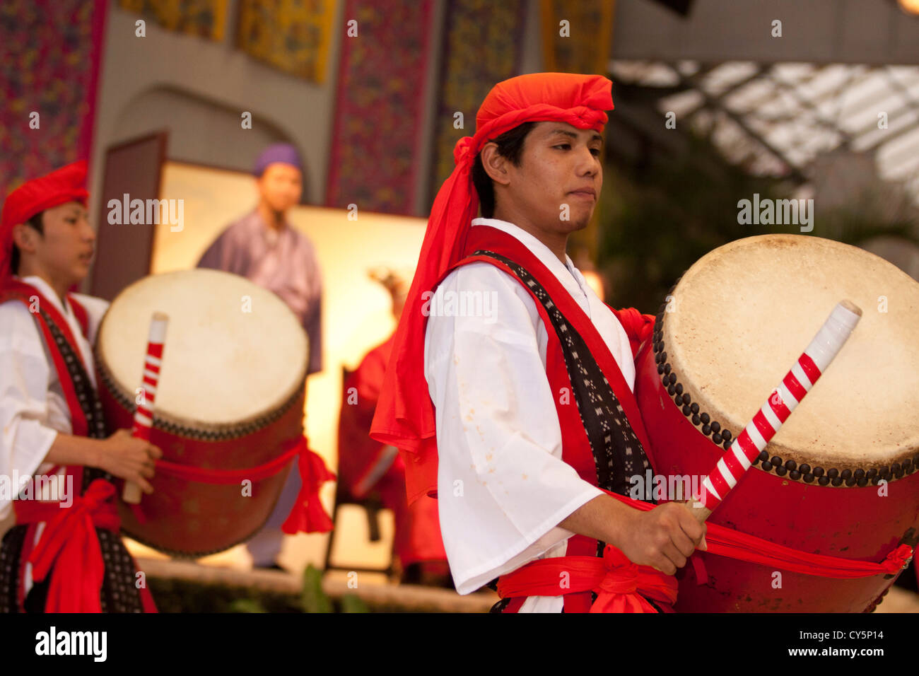 A male dancer performs a traditional Okinawan dance at Ryukyu Village