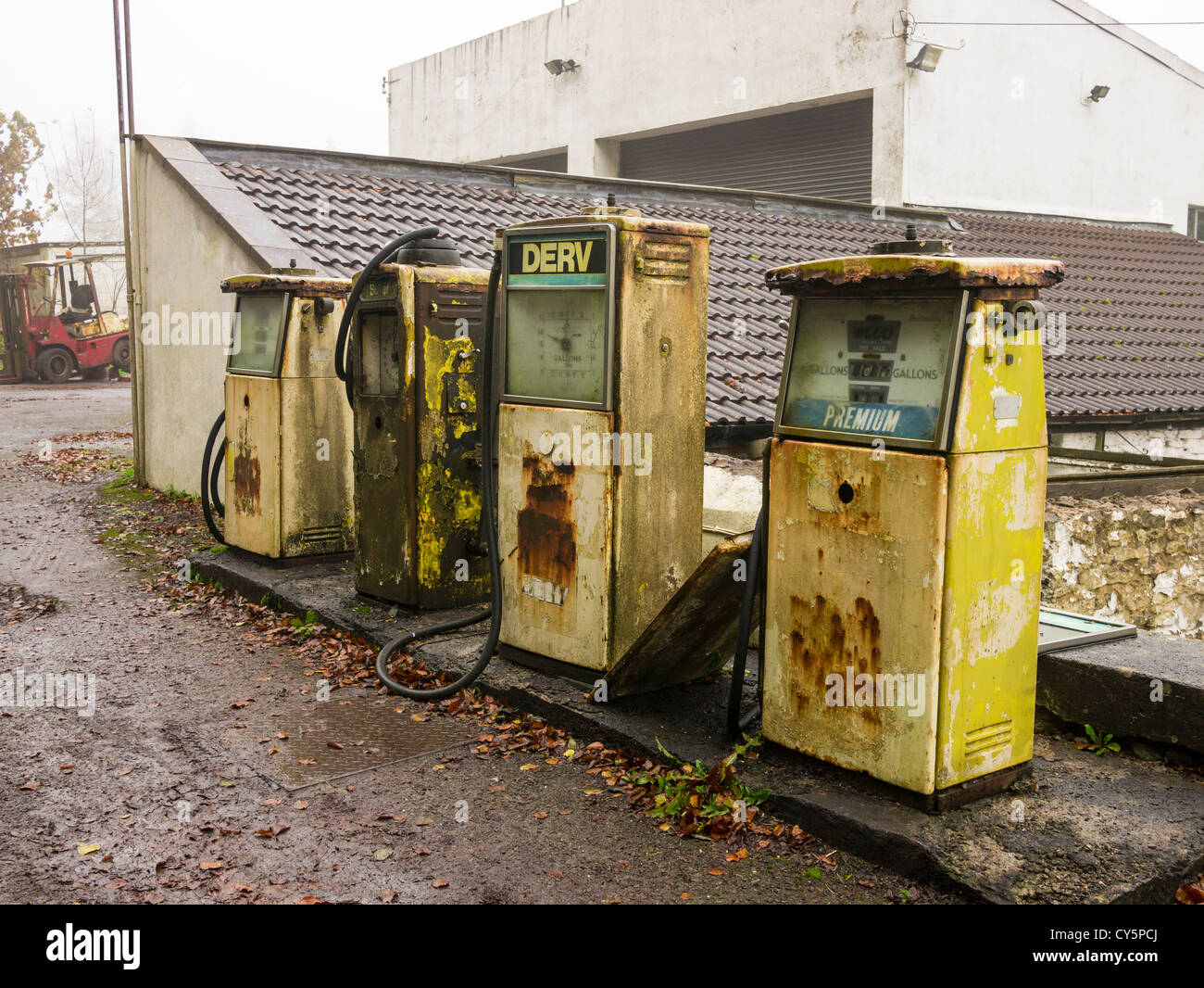Old style dissused petrol and diesel fuel pumps. Stock Photo