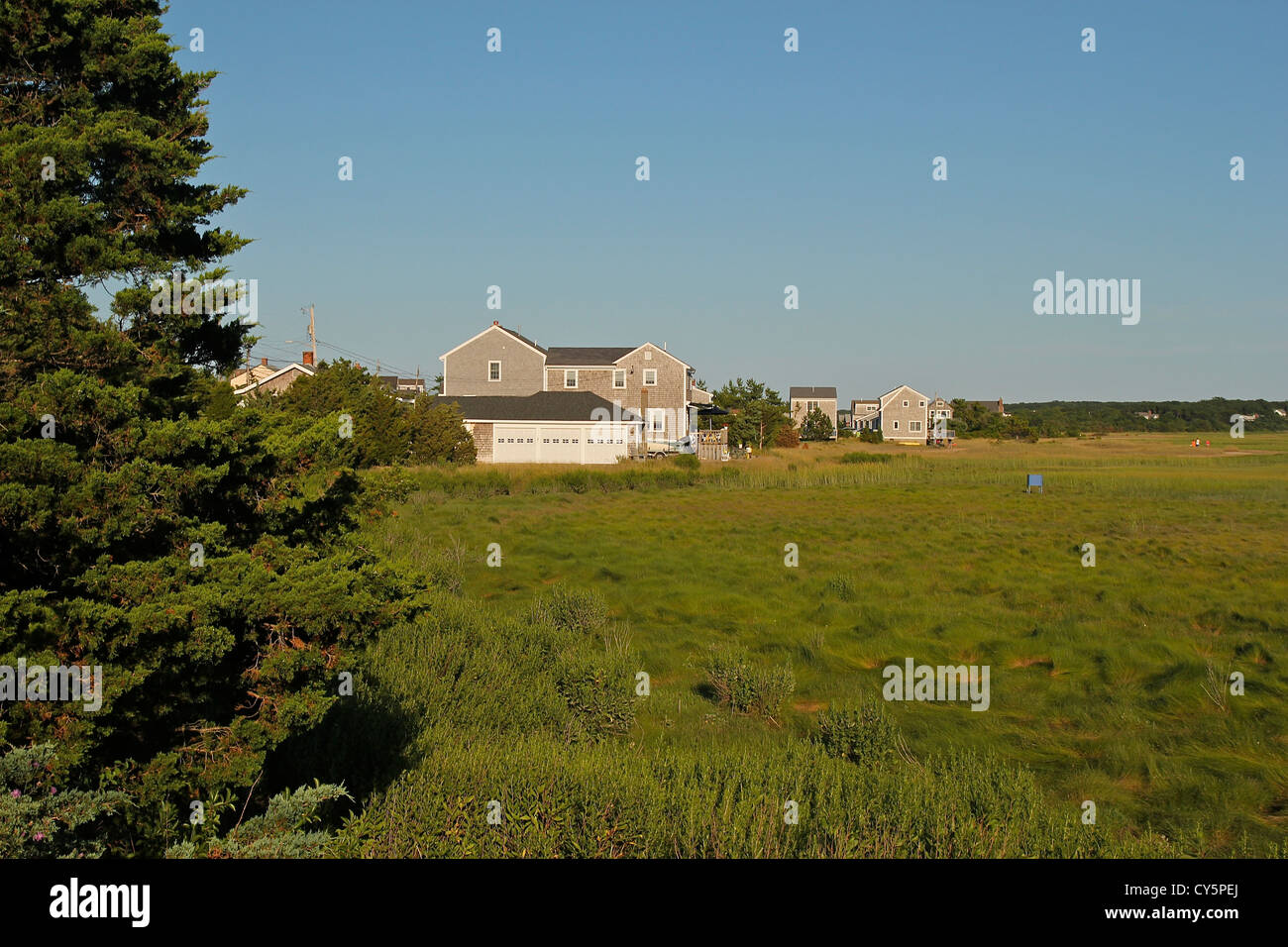 A home seen from across the marsh, Cape Cod, Massachusetts Stock Photo
