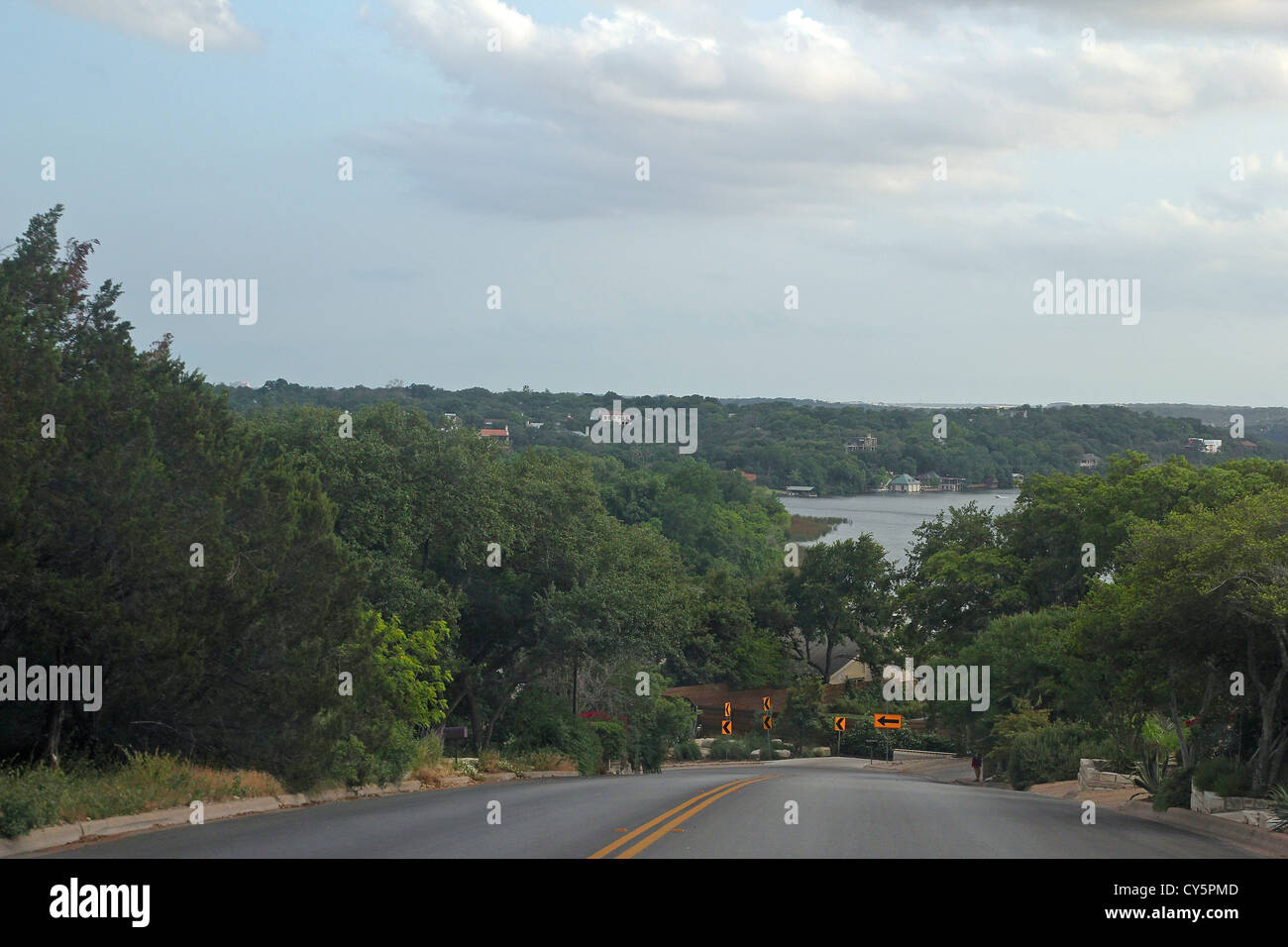 A curving road on a hill on the outskirts of Austin, Texas Stock Photo