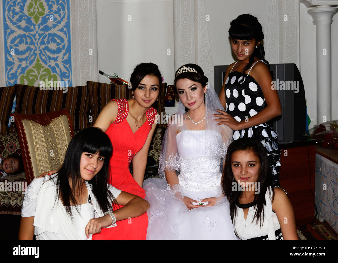 A Tajik bride with her friends. Stock Photo
