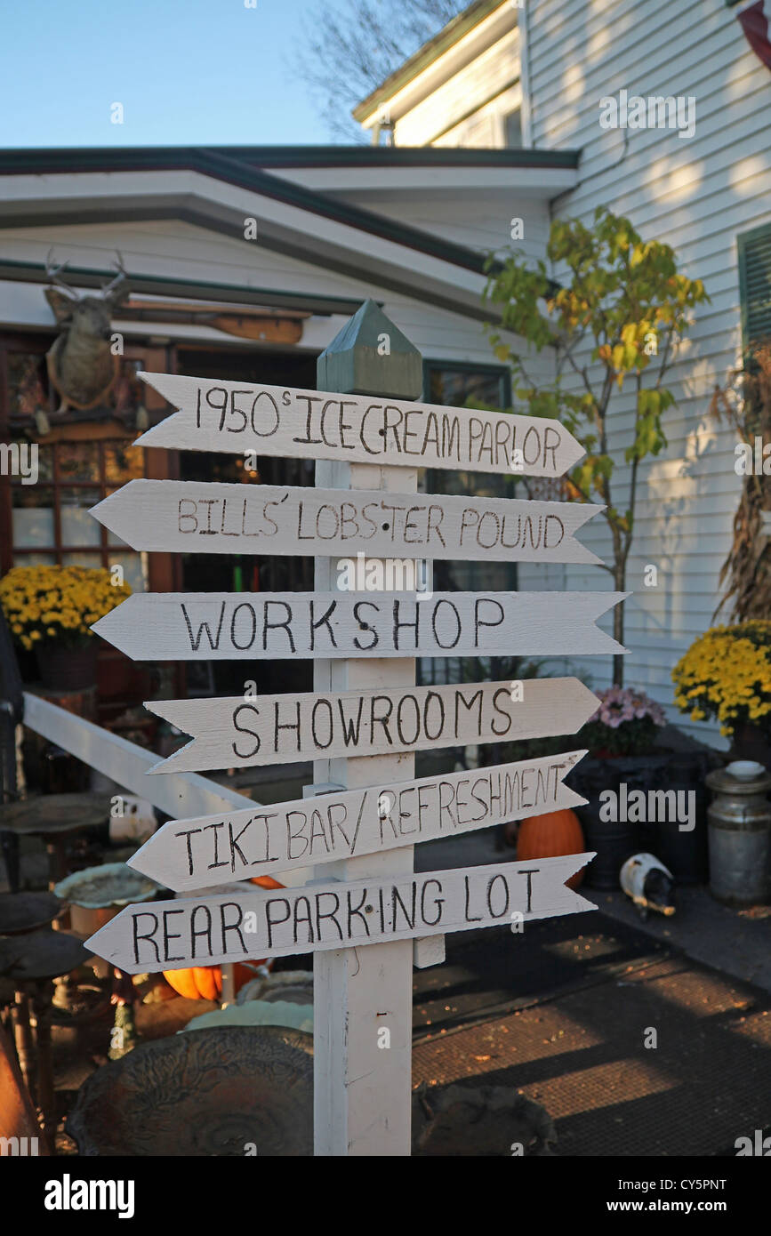 Signs in front of William Austin's Antiques, Chester, Vermont Stock Photo