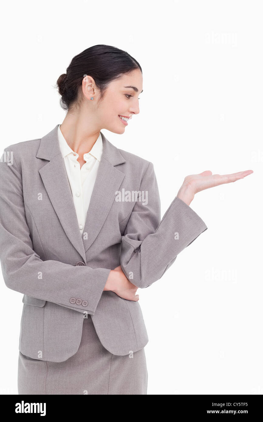Young businesswoman looking at her palm Stock Photo - Alamy