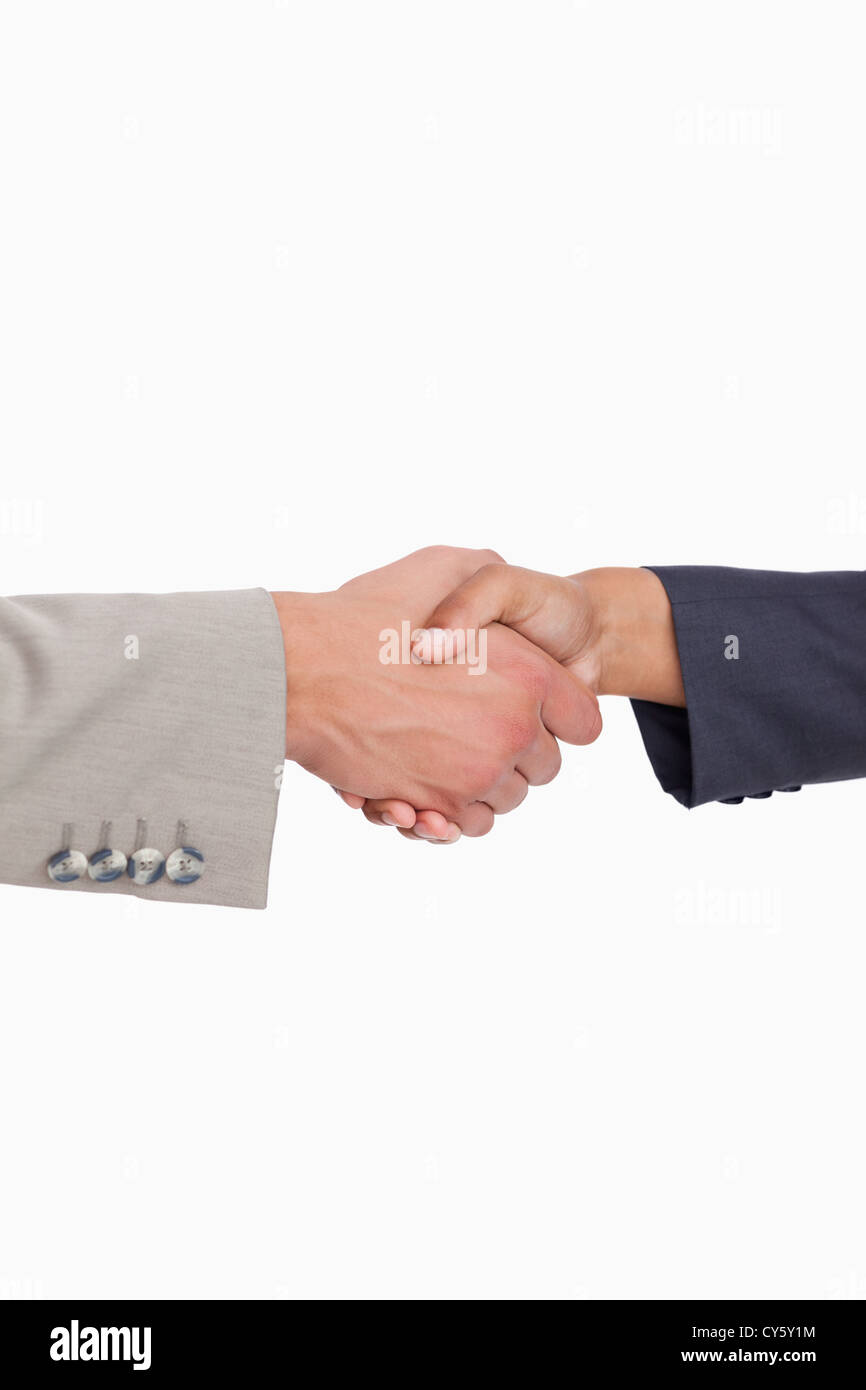 Side view of shaking hands of business people Stock Photo
