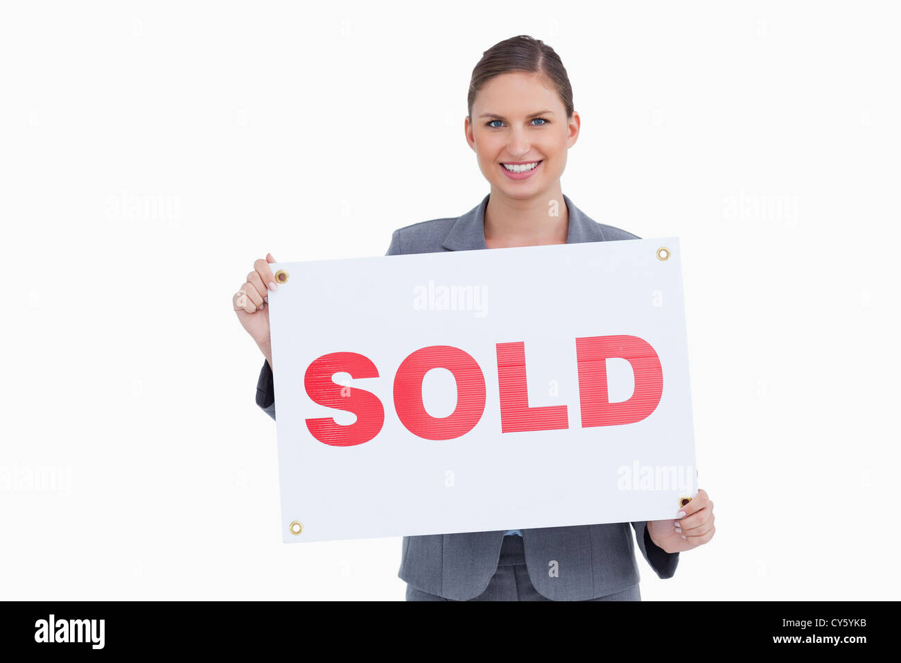 Woman holding sold sign hi-res stock photography and images - Alamy