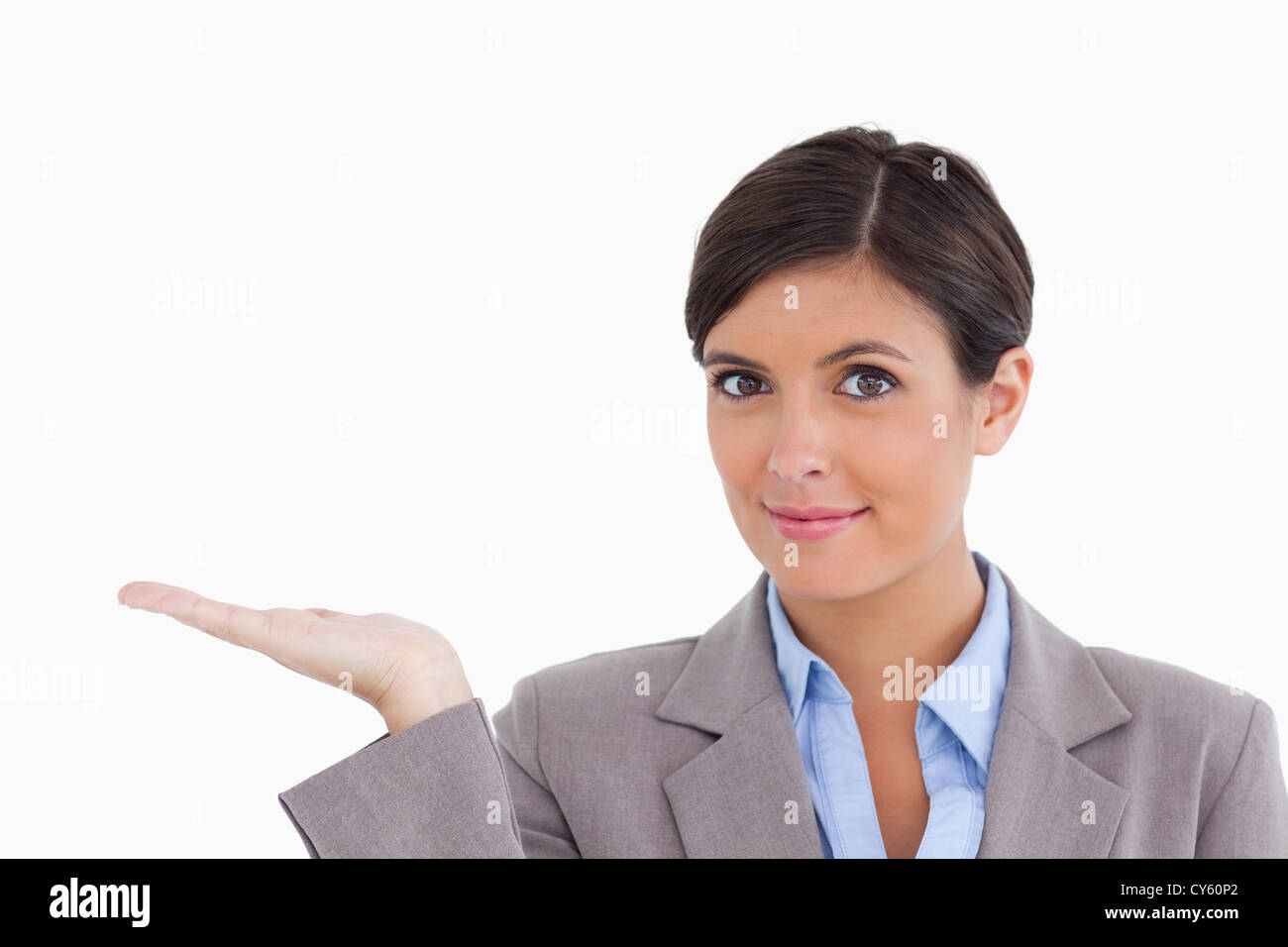 Close up of female entrepreneur presenting with palm up Stock Photo Alamy