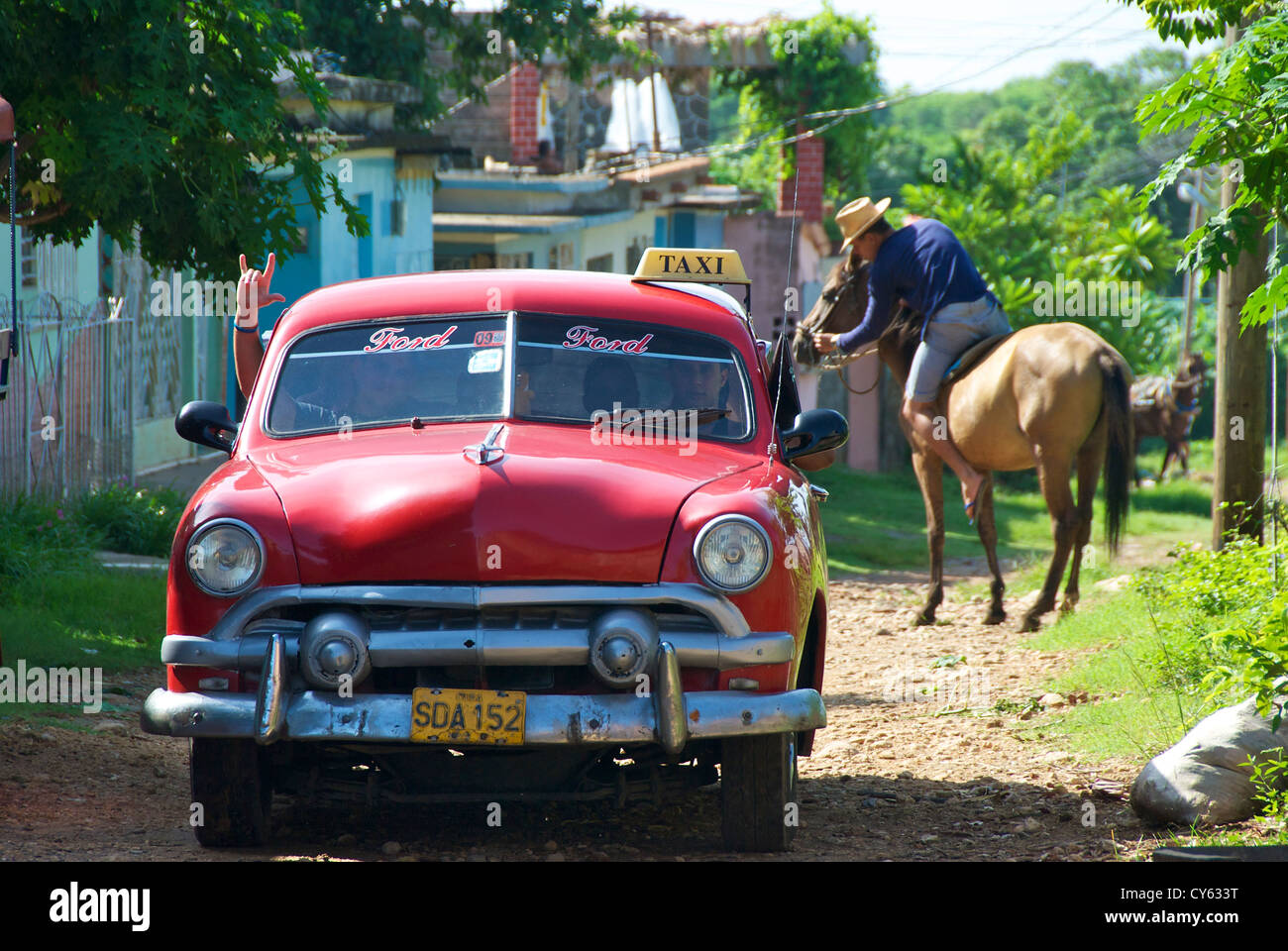 Car and horse Trinidad Stock Photo