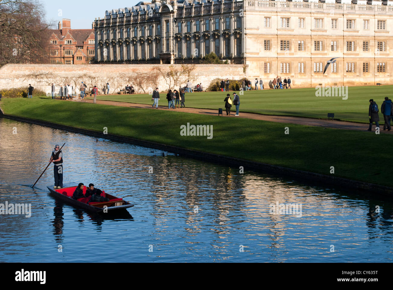 Punt on the Cam in Cambridge near King's College with Old Court of Clare College in the background Stock Photo