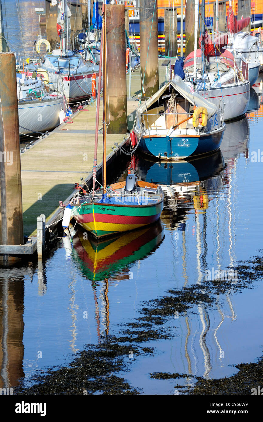 Yachts and small sailing boats at mooring in Whitby harbour, Yorkshire