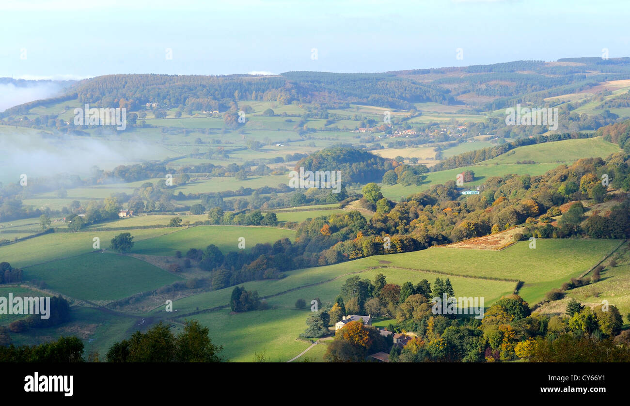 A misty landscape looking over towards Boltby in North Yorkshire from Sutton bank. Stock Photo