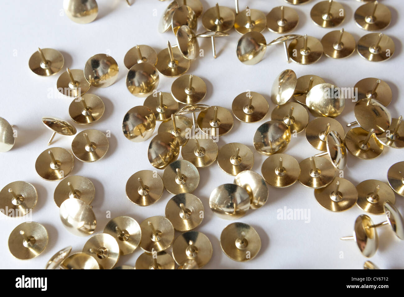 A scattering of pin tacks Stock Photo