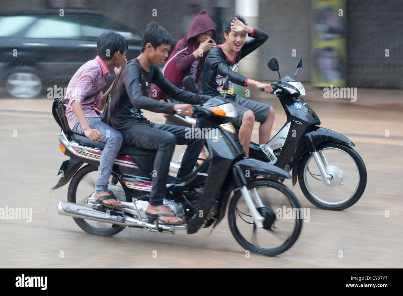 boys riding motorcycles