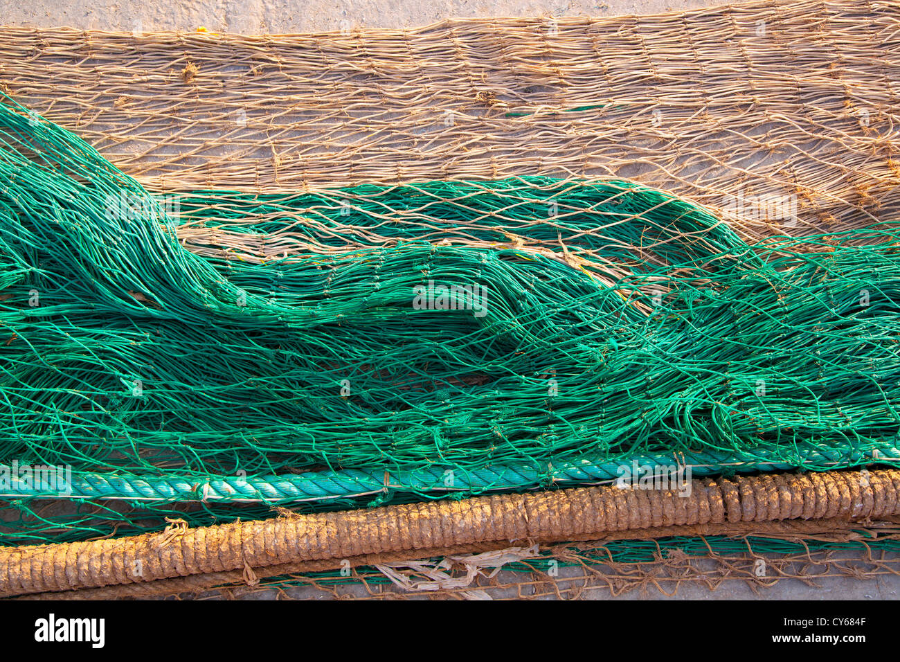 fishing nets texture pattern over soil in green and beige colors Stock