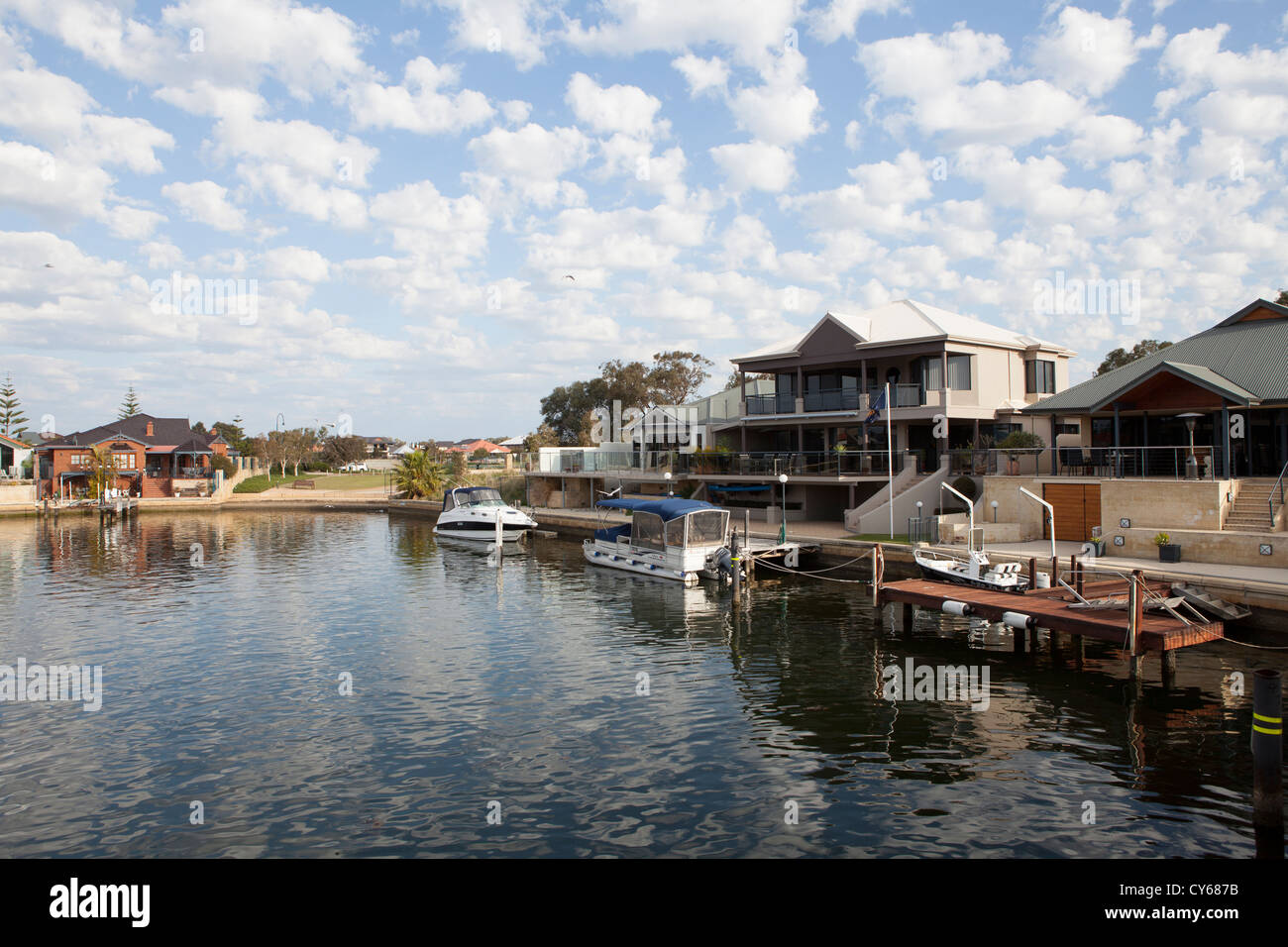 Expensive houses along the waterfront of Mandurah Canals, Mandurah, Western Australia. Stock Photo