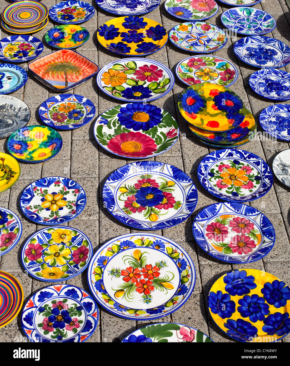 ceramics from Mediterranean Spain in street market display on floor