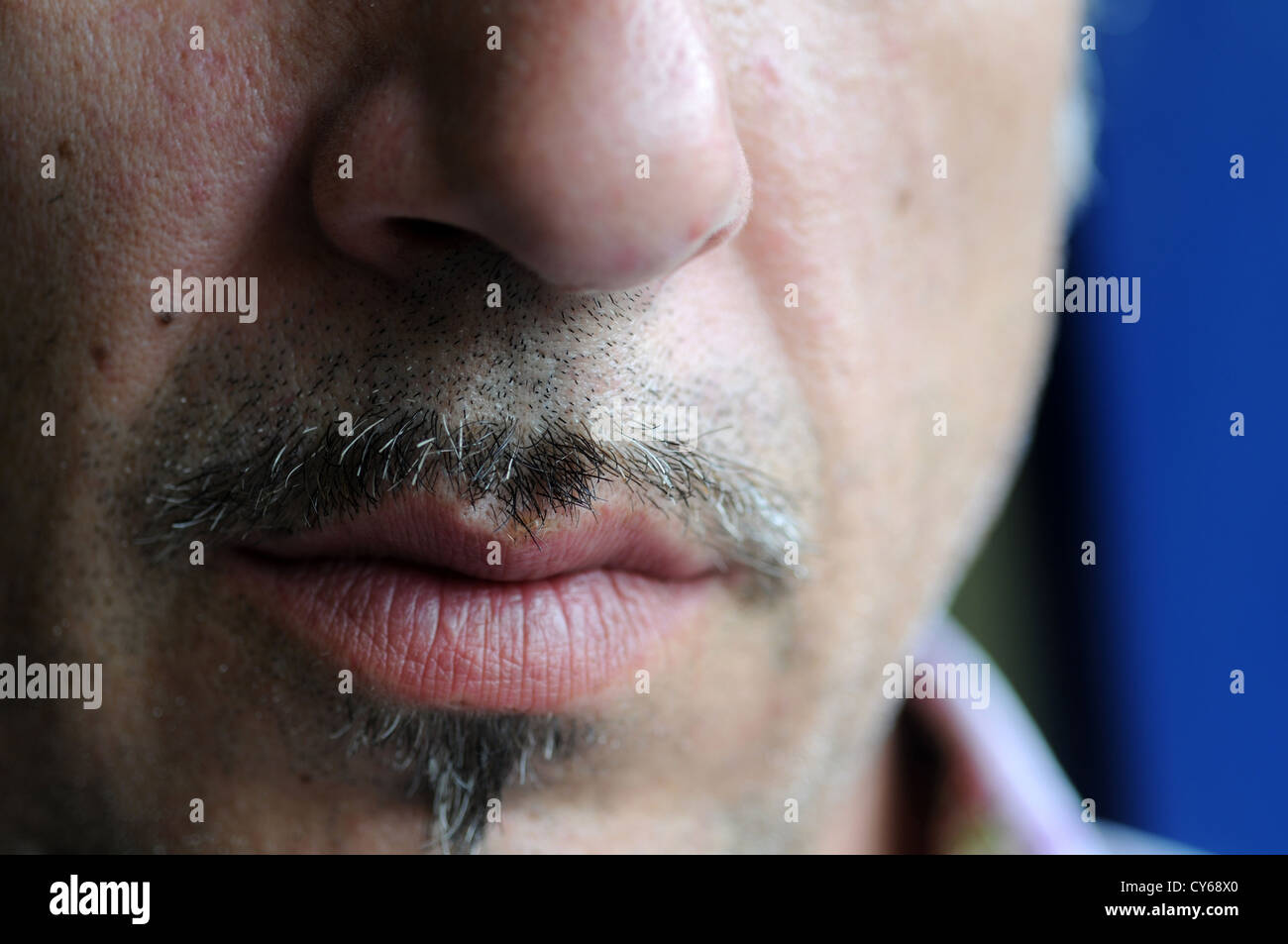 closeup mustaches and closed mouth of mature man Stock Photo