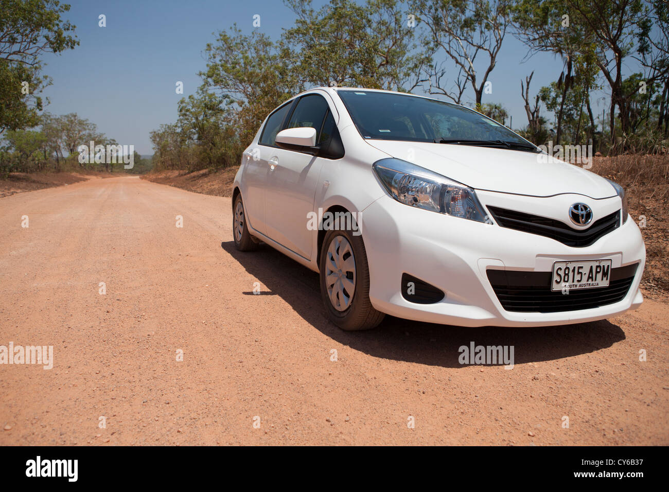 Small Toyota Yaris rental car on an Australian outback unsealed dirt