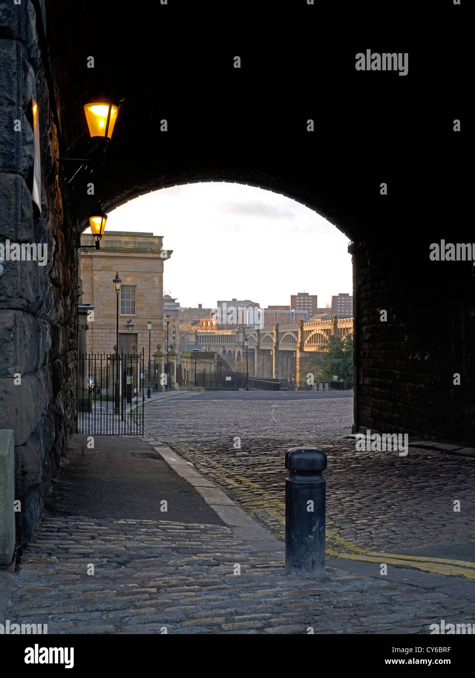 Looking at The High Level Bridge through a dimly lit railway arch in Newcastle-upon-Tyne in the North East of England Stock Photo