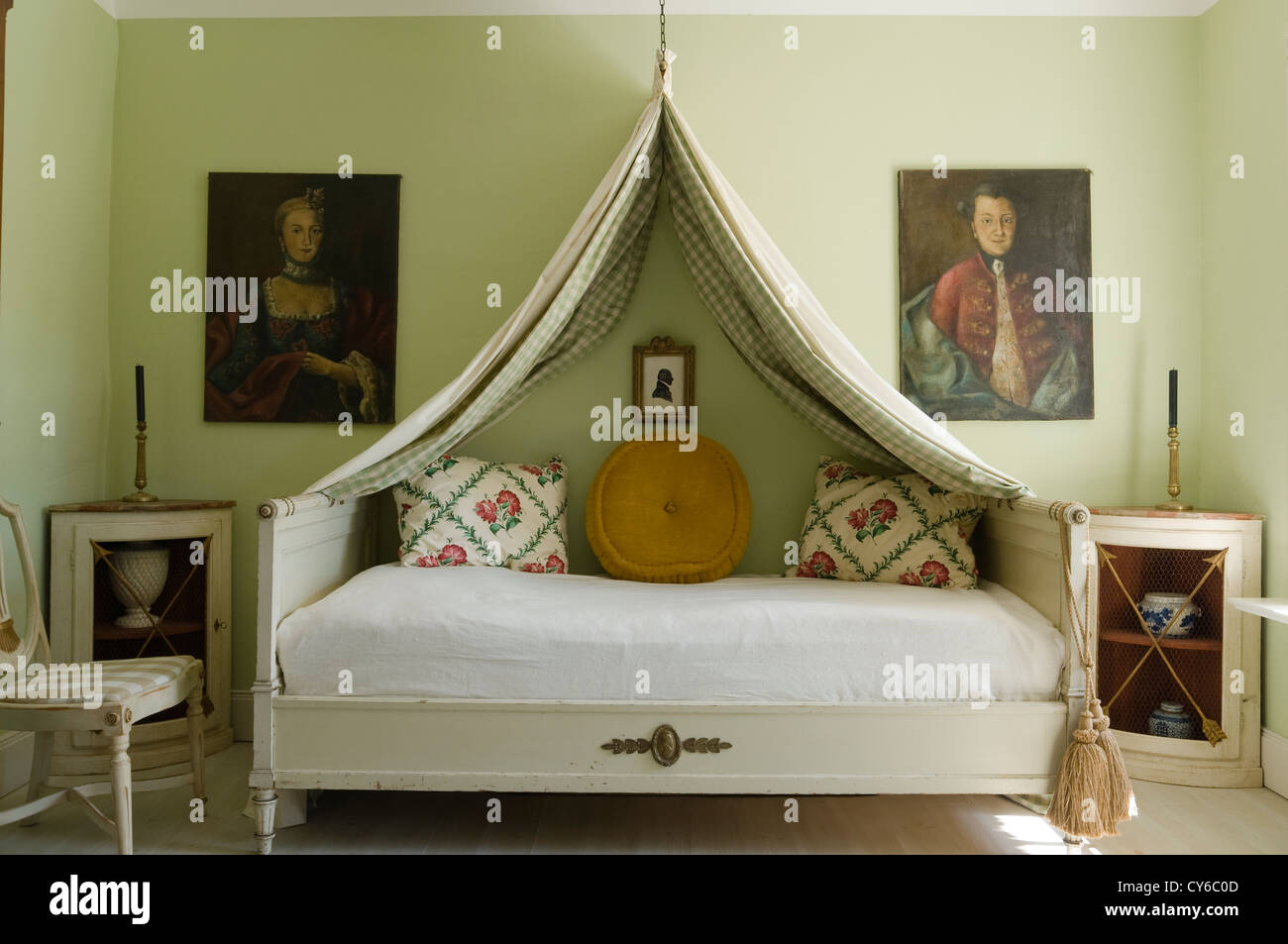 Beautiful pale green bedroom in German farmhouse restoration dating from 1820s Stock Photo