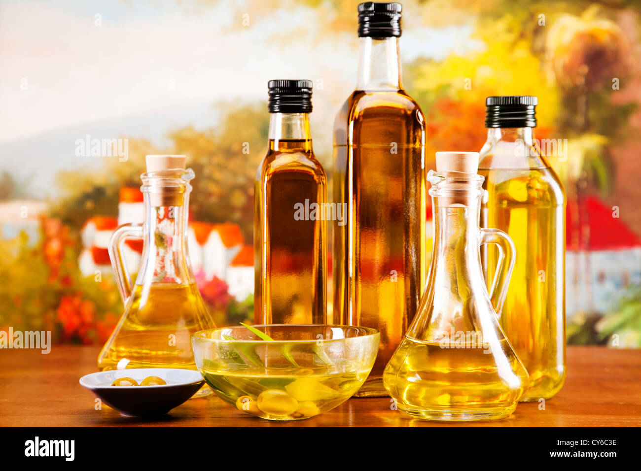 Fresh olives, olive oil on olive wood. Extra virgin Stock Photo Alamy