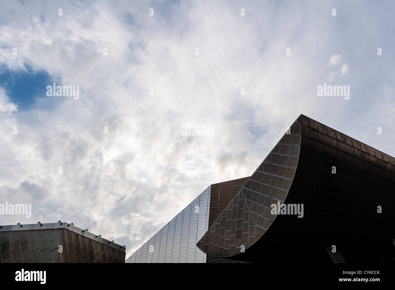 Image of the sculptural structure of The Lowry, juxtaposed with Sky. Stock Photo
