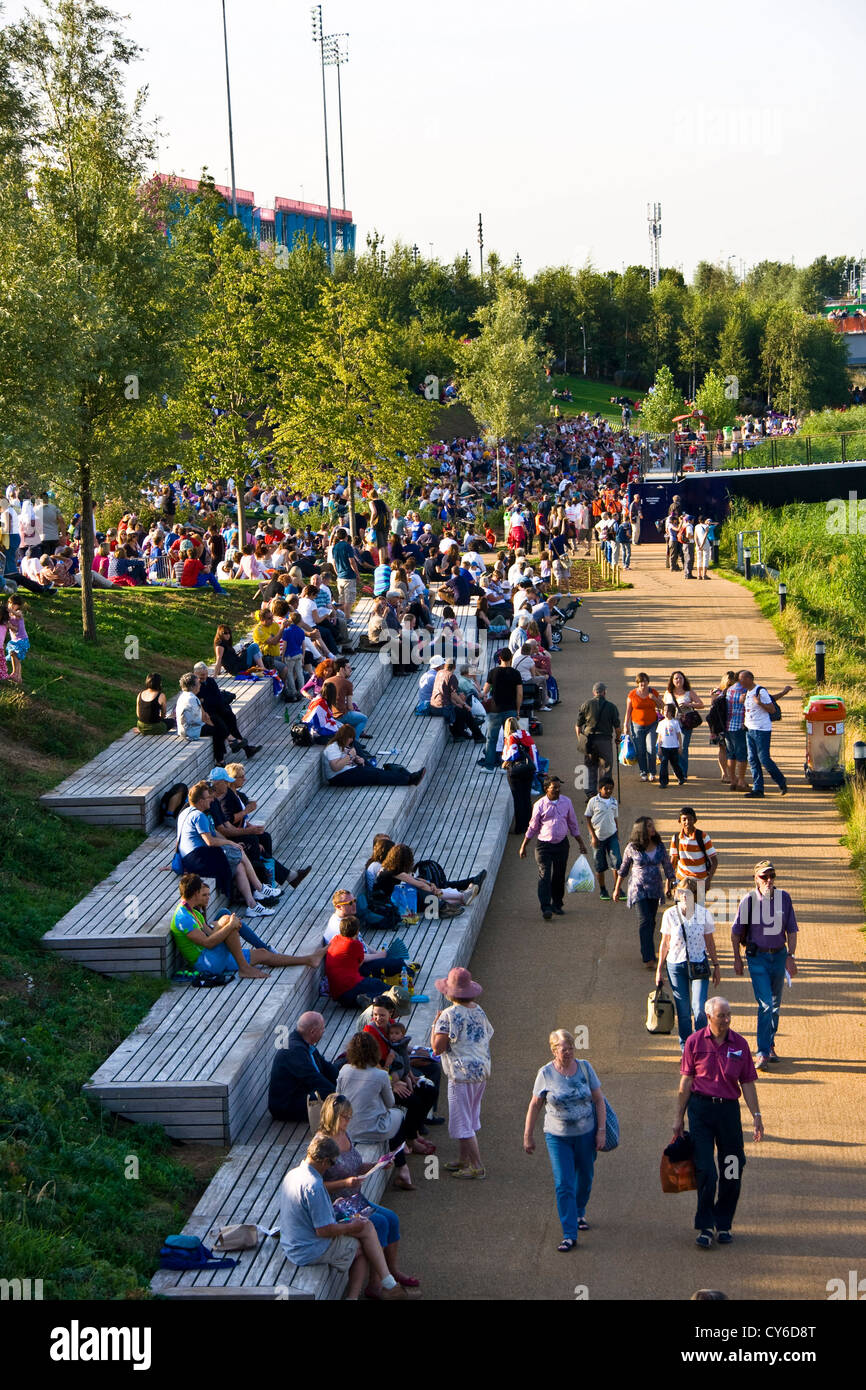 Spectators relaxing in London 2012 Olympic/Paralympic park Stratford England Europe Stock Photo