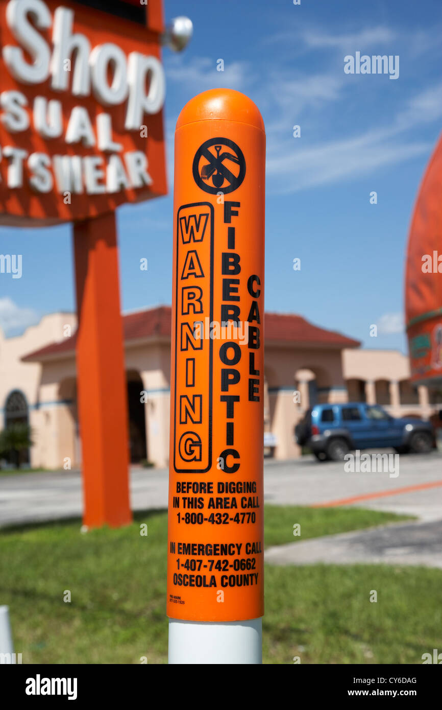 warning buried fiber optic cable marker in kissimmee florida usa Stock Photo