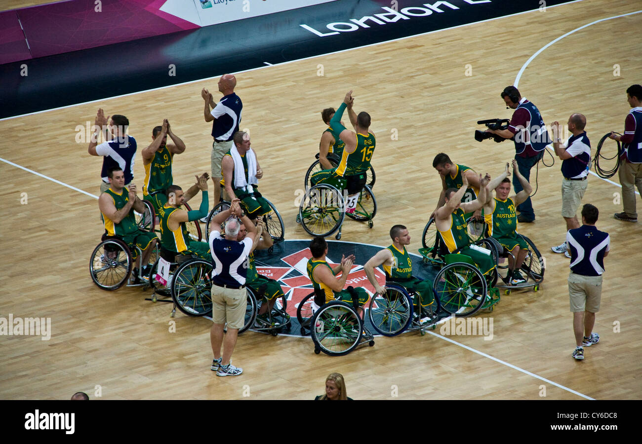 Australian wheelchair basketball team accepting applause after 68 - 48 points win over Italy at London 2012 Paralympic Games Stock Photo