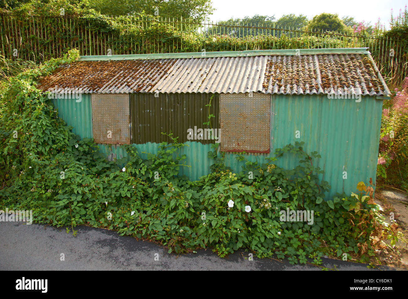 Old garage with a tin roof Stock Photo