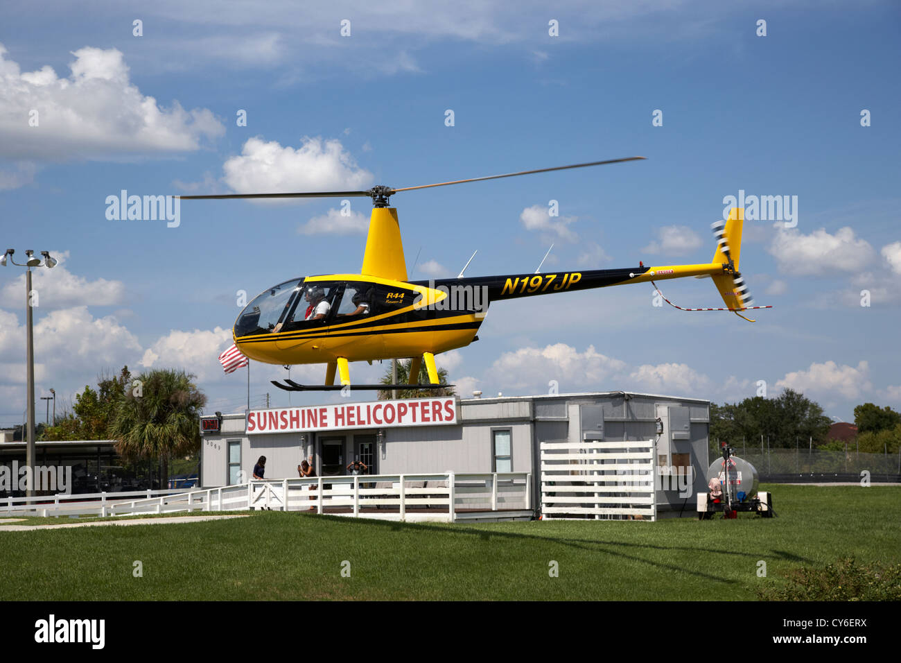 tourist light helicopter tour flight coming in to land kissimmee florida usa Stock Photo