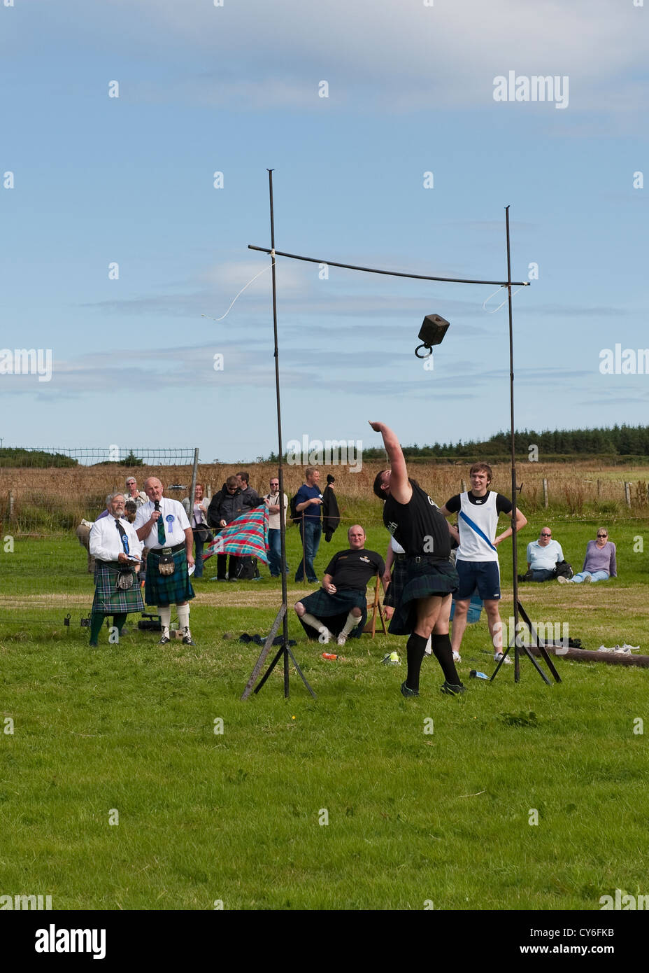 Weight Over the Bar competition at Highland Games in Mey, Caithness Stock Photo