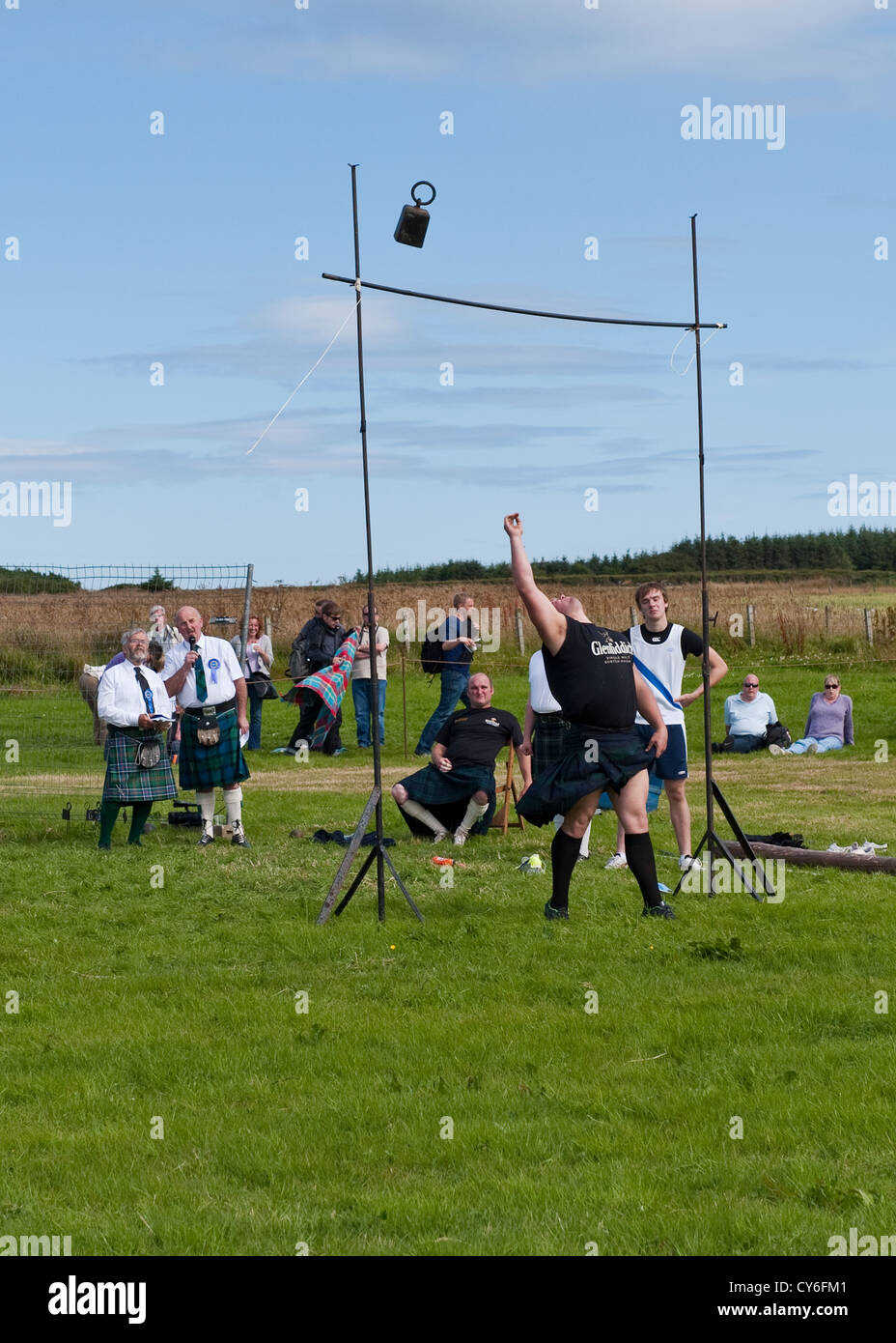 Weight Over the Bar competition at Highland Games in Mey, Caithness Stock Photo
